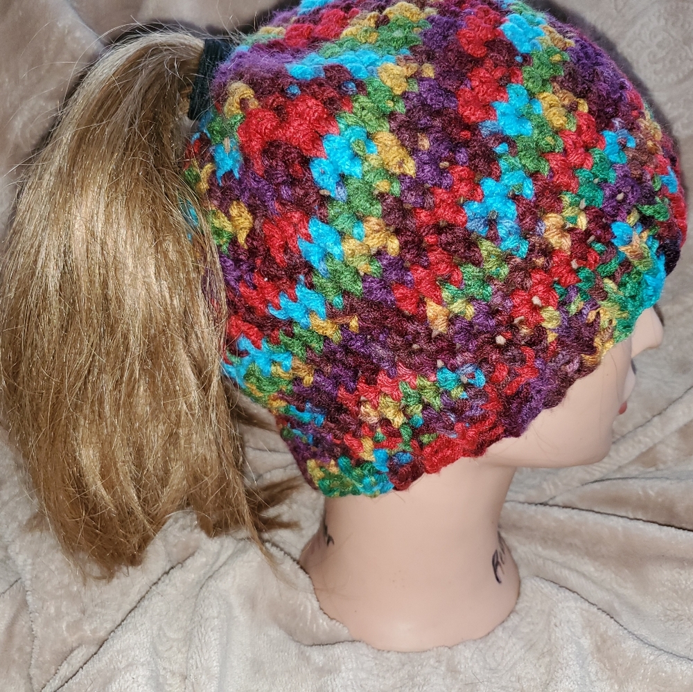 Crocheted messy bun beanie